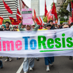 Aksi protes hak pekerja menyoroti risiko perbudakan modern bagi masyarakat di Indonesia.