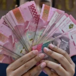 Mengapa pelemahan rupiah Indonesia menjadi peringatan serius bagi perekonomiannya yang bernilai $1,4 triliun.