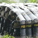 Ketegangan antara kepolisian dan militer di Indonesia menjadi sorotan setelah penggerebekan di Jakarta
